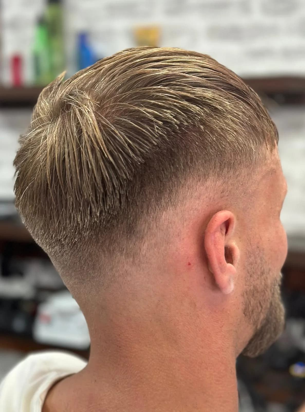 Skin fade met strak verzorgde baard bij Barbershop De Maten in Apeldoorn